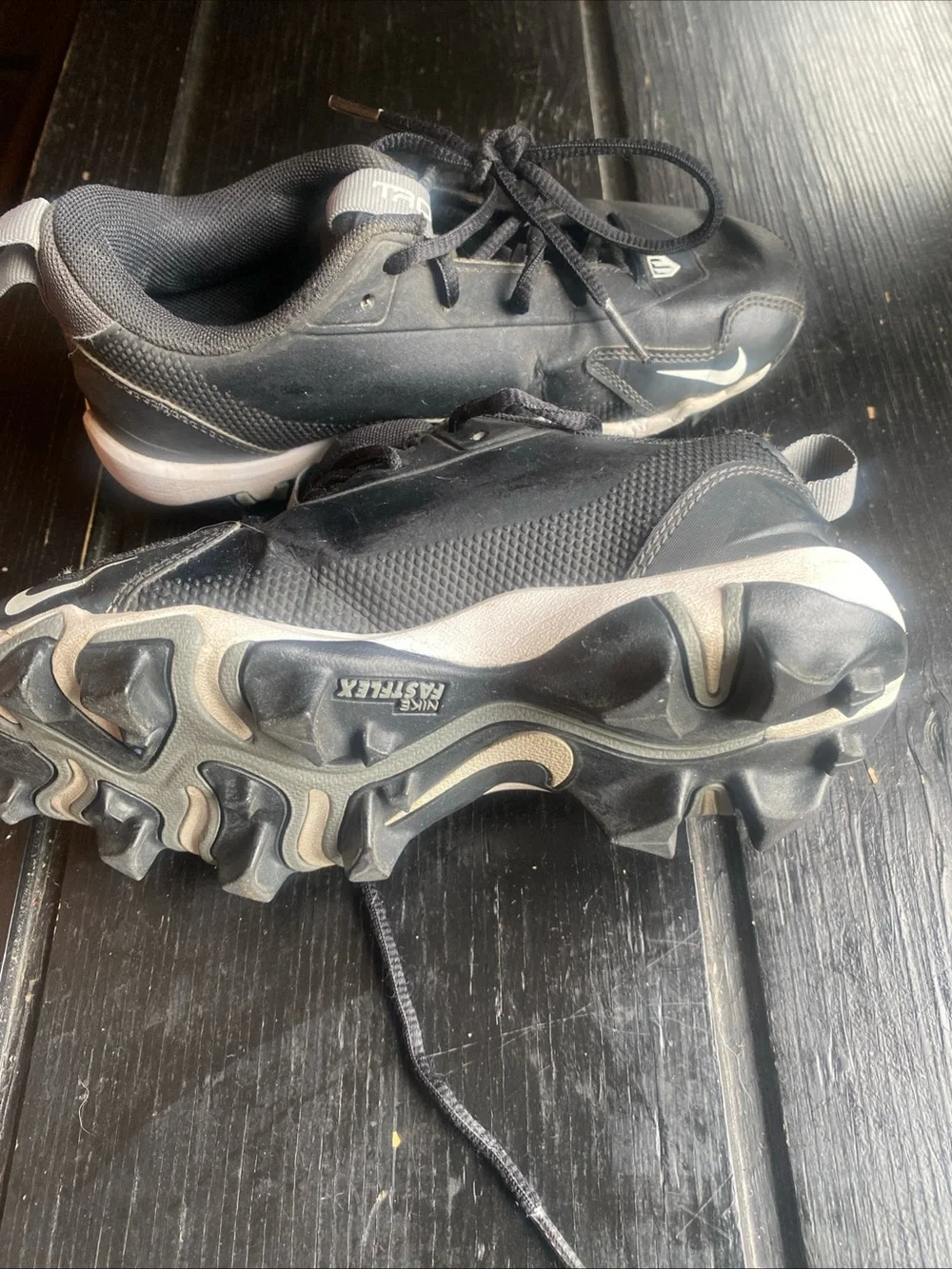 Nike Kids Black Sneakers with White Swoosh football soccer baseball cleats